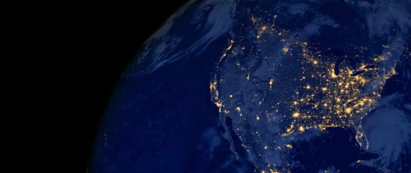 Satellite view of the earth with points of light