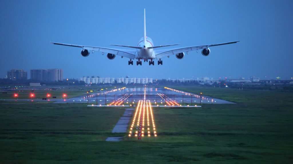 An airplane landing on a runway