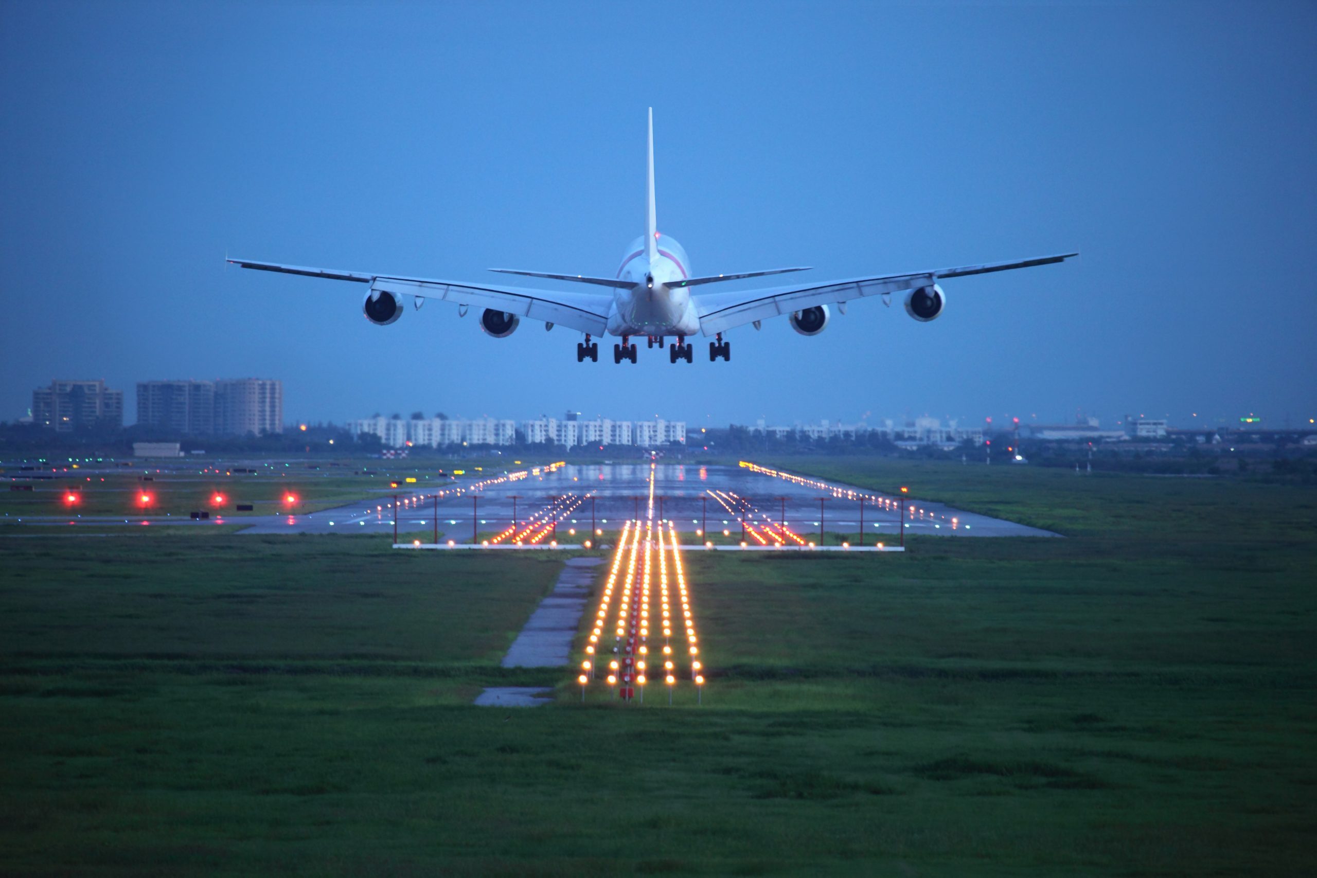 An airplane landing on a runway